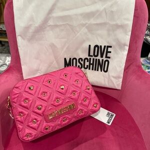 NWT Love Moschino Fuchsia Quilted Crossbody Bag with dust bag.
